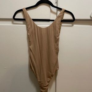 Tan low back body suit